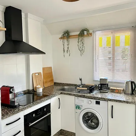 Апартаменти Atico 2 A 290mt De La Playa De Boliches